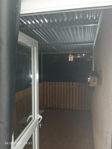 a garage with a metal ceiling and a door at רימון יחידות אירוח Vacation units RIMON in Ashqelon