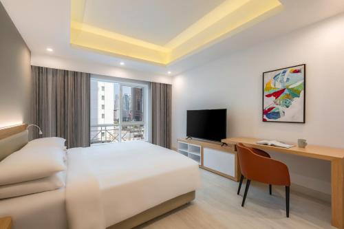 TV a/nebo společenská místnost v ubytování Marriott Executive Apartments City Center Doha