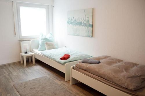 Llit o llits en una habitació de Monteur-Bungalow Dortmund