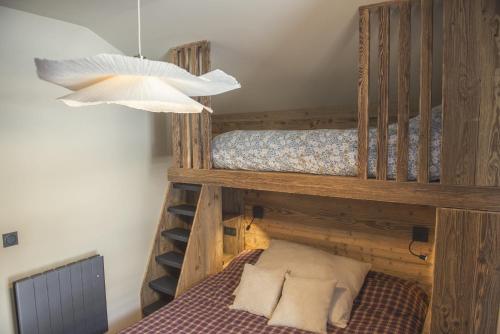 Ένα ή περισσότερα κρεβάτια σε δωμάτιο στο SmartStay Cocon Alpin - Meribel