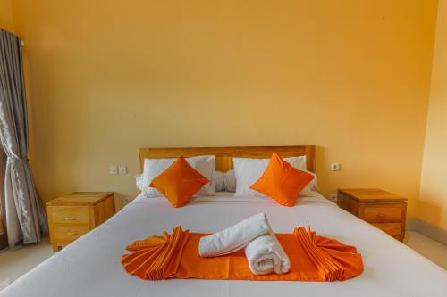 Ένα ή περισσότερα κρεβάτια σε δωμάτιο στο Srinadi Waterpark Villa