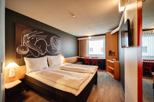 Posteľ alebo postele v izbe v ubytovaní ibis Wien City