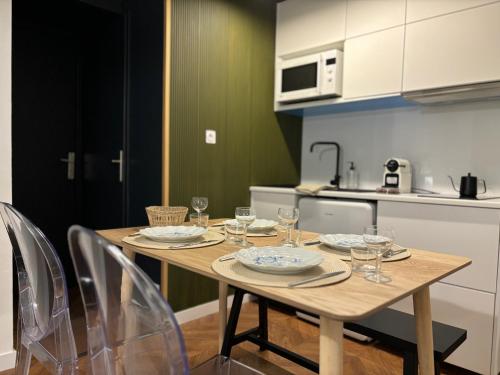 Photo de la galerie de l'établissement Appartement au centre-ville à 100 m des télécabines avec parking souterrain gratuit, à Luchon