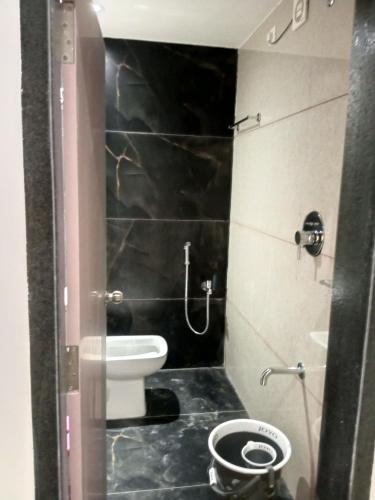 Phòng tắm tại VJ GRAND LODGE N FUNCTION HALL