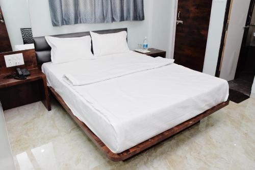 Cama o camas de una habitación en Shankar Residency, Akkalkot