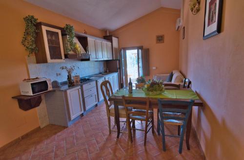 Kuchyň nebo kuchyňský kout v ubytování B&B Diacceroni