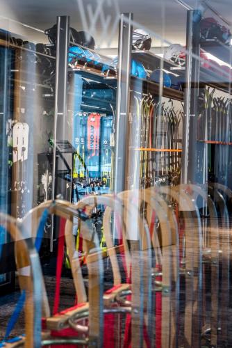 a reflection of a person riding a bike in a gym at Kaiserlodge in Scheffau am Wilden Kaiser