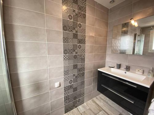 Et badeværelse på Maison de vacances en front de mer