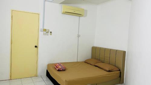 Katil atau katil-katil dalam bilik di Pangkor 48 HomeStay