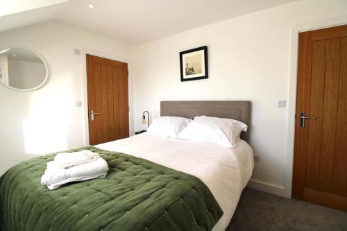 Ένα ή περισσότερα κρεβάτια σε δωμάτιο στο No.10 @ ShortStays Serviced apartments