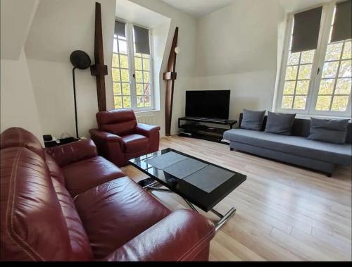 Posezení v ubytování Un appartement dans un château