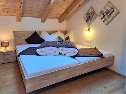Postel nebo postele na pokoji v ubytování Apartment Margret- Top 12 by Interhome