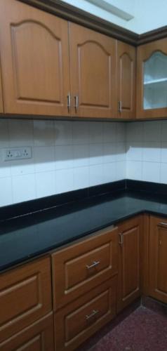 Kuchyň nebo kuchyňský kout v ubytování Brookside Service Apartment
