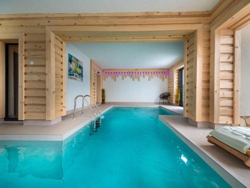 a pool in the middle of a house at Holiday Home Gorski Hedon by Interhome in Čabar