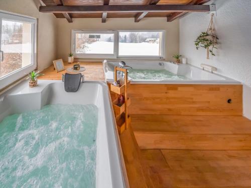 a large tub with water in it in a room at Holiday Home Gorski Hedon by Interhome in Čabar