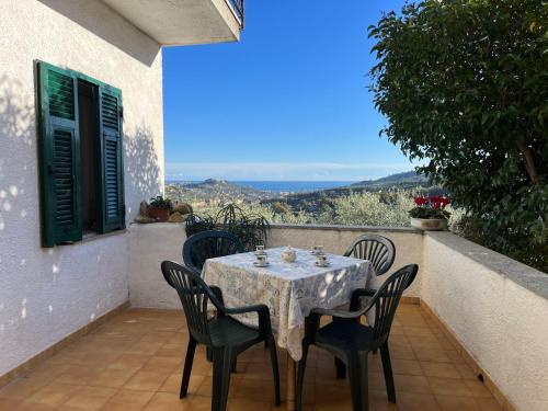 a table and chairs on the balcony of a house at Apartment Casa Iose by Interhome in Torrazza