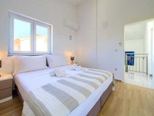 Postel nebo postele na pokoji v ubytování Holiday Home Bernarda by Interhome