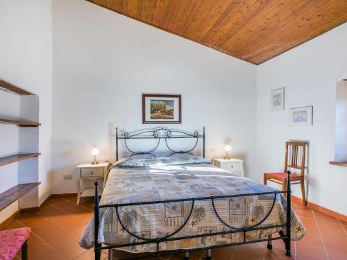 Postel nebo postele na pokoji v ubytování Holiday Home I Tre Laghi by Interhome