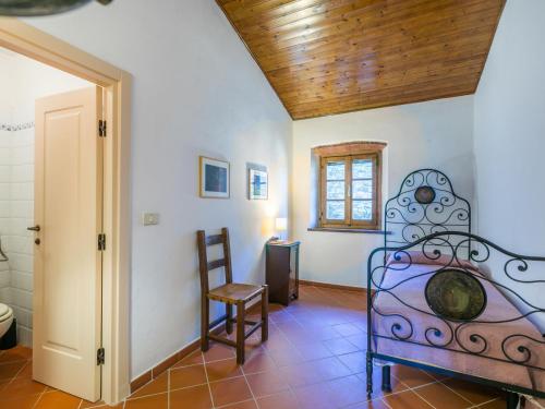 Postel nebo postele na pokoji v ubytování Holiday Home I Tre Laghi by Interhome