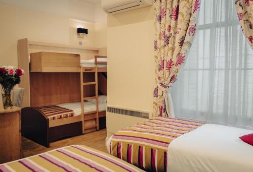 Athena Hotelにあるベッド