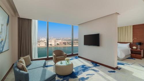 a hotel room with a view of the city at Fairmont Bab Al Bahr in Abu Dhabi