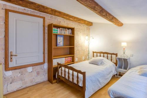 Postel nebo postele na pokoji v ubytování Maison en Petite Camargue