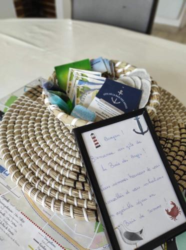 a cell phone sitting on top of a table at Gite de la Baie des anges in Saint-Valery-sur-Somme