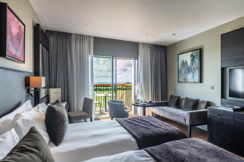 Postel nebo postele na pokoji v ubytování Twr y Felin Hotel