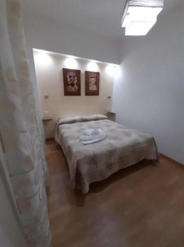 Postel nebo postele na pokoji v ubytování Milazzo La Porta Delle Eolie 2.0
