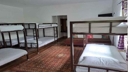 Katil atau katil-katil dalam bilik di Blossom Inn