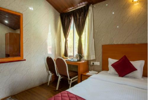 Katil atau katil-katil dalam bilik di Blossom Inn