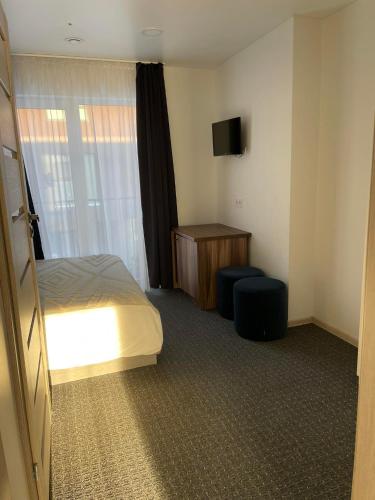 Katil atau katil-katil dalam bilik di Izabelės apartamentai