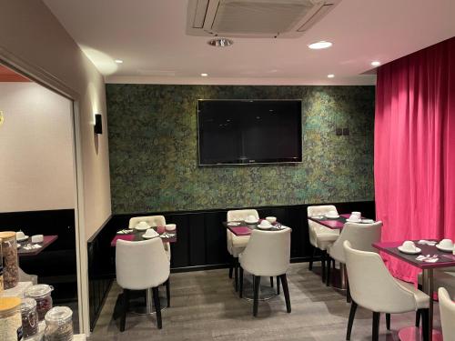 Μια τηλεόραση ή/και κέντρο ψυχαγωγίας στο Best Western Allegro Nation