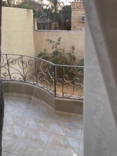 a view of a balcony with a wrought iron fence at Sweet Home in Cairo
