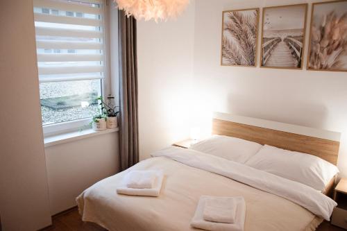 Apartmán Bakossova centrum Banská Bystrica tesisinde bir odada yatak veya yataklar