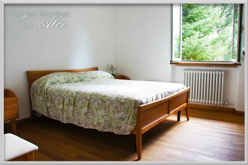 Cama o camas de una habitación en B&B Alce