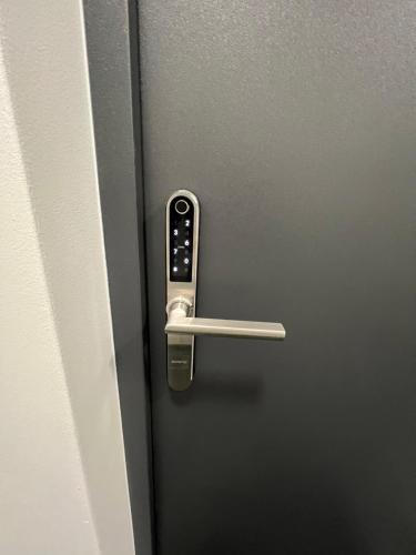 a door with a silver door knob on it at ANETT Apartament nr 4 in Sulęcin