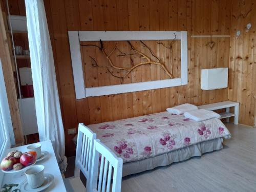 Posteľ alebo postele v izbe v ubytovaní B&B L'Ortensia