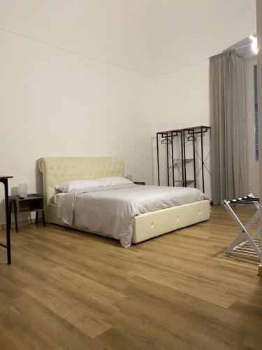 Postel nebo postele na pokoji v ubytování Le Stanze Di Ambra