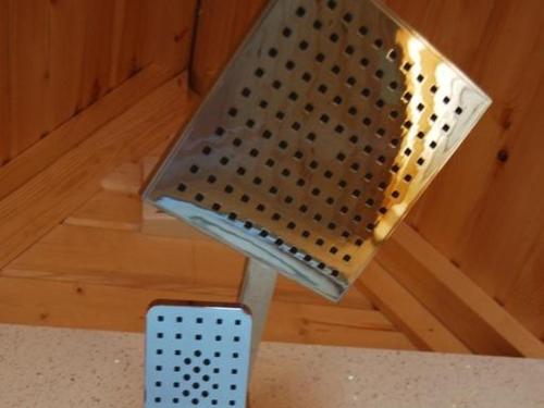 a metal object sitting on top of a wooden floor at Romantic Rural Retreats in Crewkerne