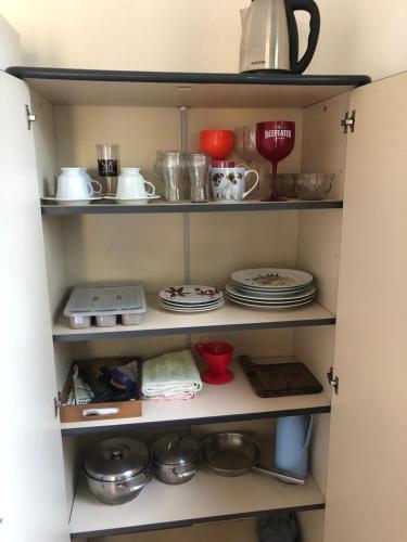 Køkken eller tekøkken på Casinha do Peró aconchegante e arejada