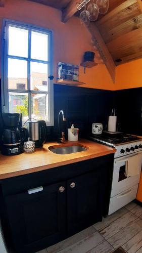 Virtuvė arba virtuvėlė apgyvendinimo įstaigoje Casa Alpina Mar del plata