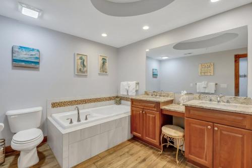 A bathroom at Oceanfront Condo with Gorgeous Views, 2 pools, Direct Beach Access