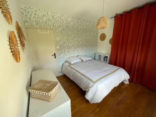 Postelja oz. postelje v sobi nastanitve La Pelencas - Maison individuelle - clim - WIFI