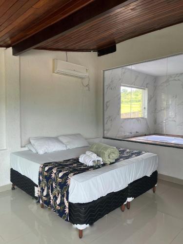 Cama o camas de una habitación en Pousada Cantim de BH