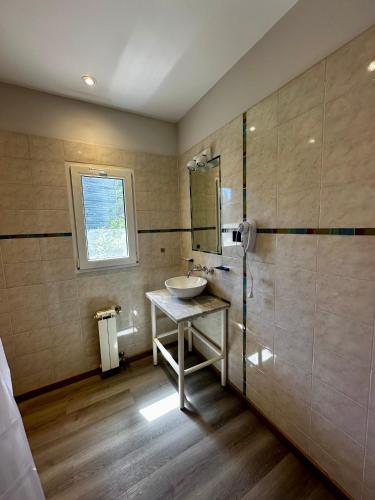 Ένα μπάνιο στο NBH Lacus Boutique Hotel