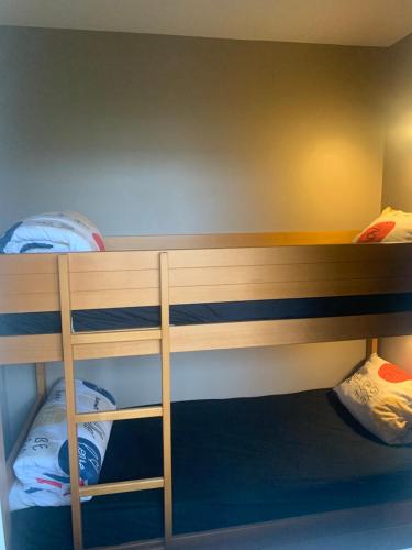a bunk bed with two bunk beds in a room at Apartments 4/5P - Disneyland Paris in Serris