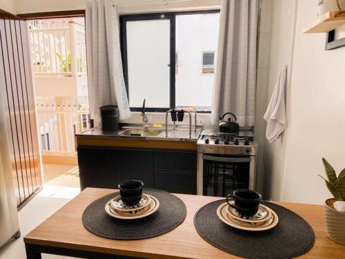 Кухня или мини-кухня в Residencial Morada do Sol - 700 metros da praia
