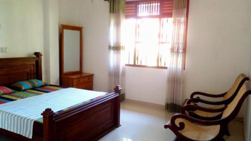 Katil atau katil-katil dalam bilik di Vero villa
