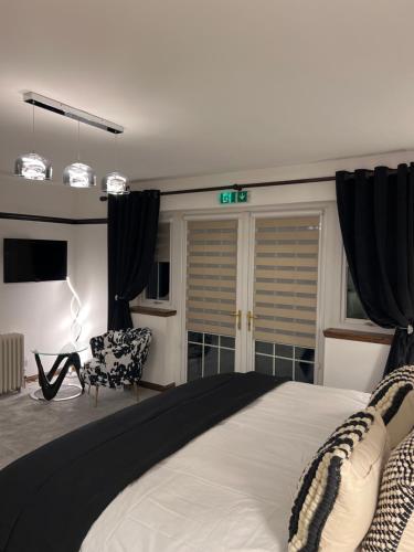 Ένα ή περισσότερα κρεβάτια σε δωμάτιο στο Druid House B&B